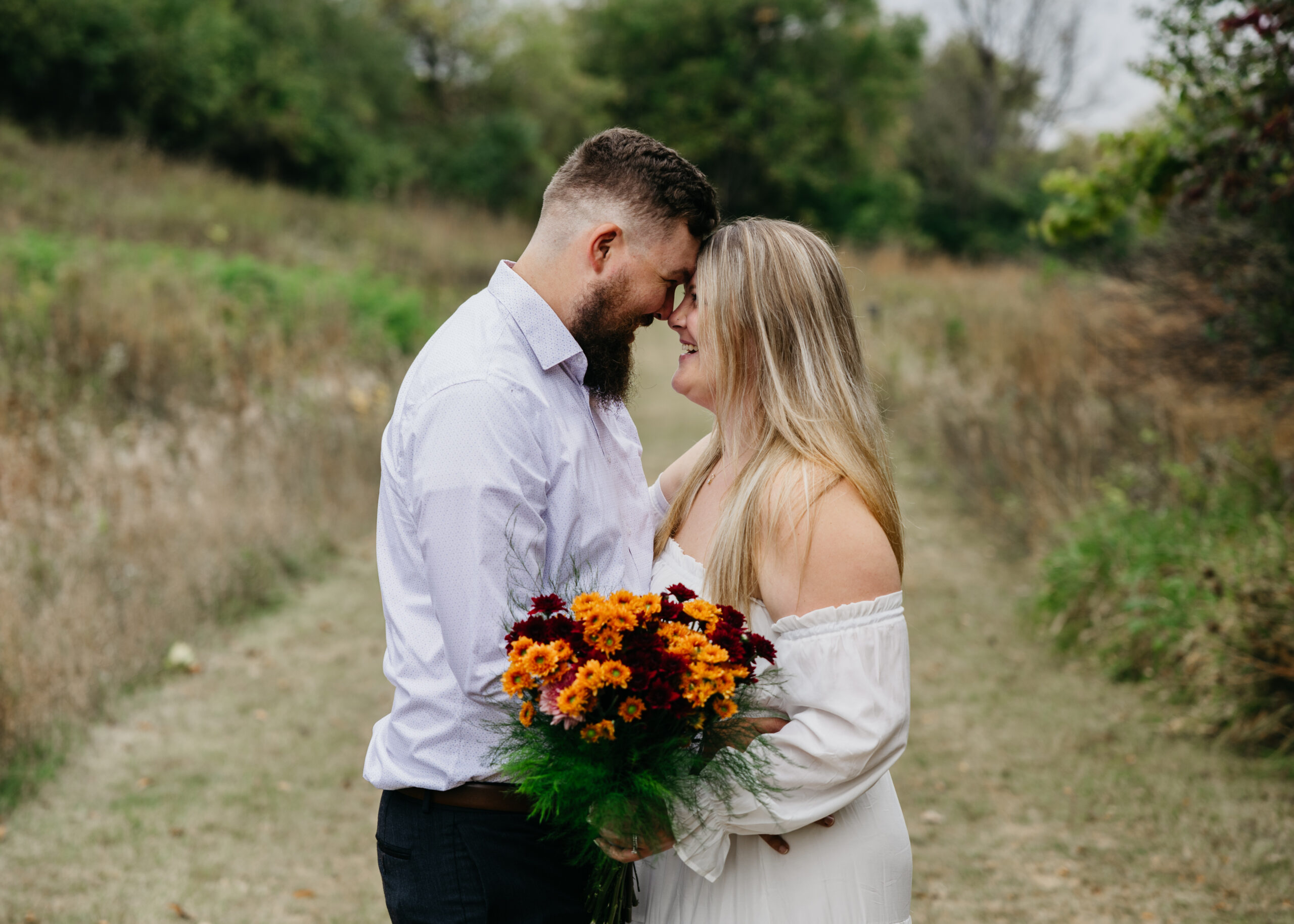 Couple posing for photos during their elopement in Wisconsin